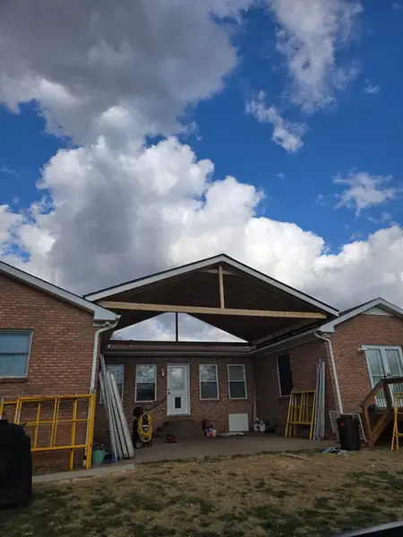 Patio Shingled Roof Installation in Clarksville — carpentry